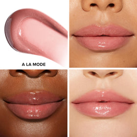Too Faced wand applicator close-up showing doe-foot tip for precise, even application