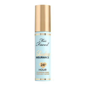 Too Faced tube next to ruler to show 0.2 fl oz compact travel-friendly size