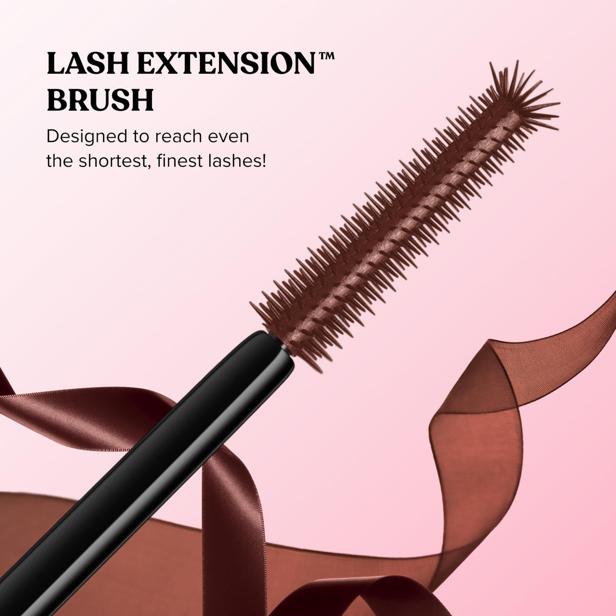 Too Faced mascara next to coin showing compact travel-friendly size