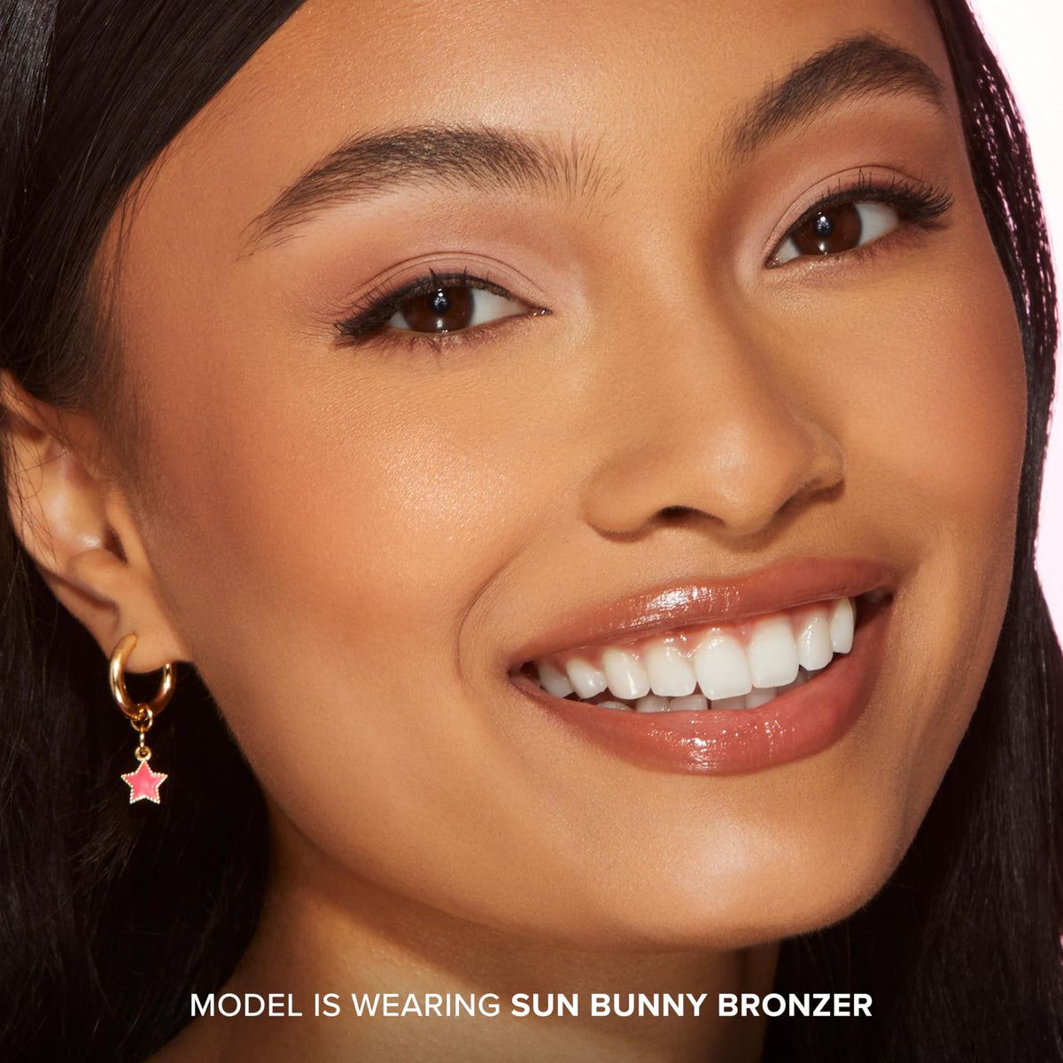 Too Faced Sun Bunny texture macro showing smooth luminous powder payoff