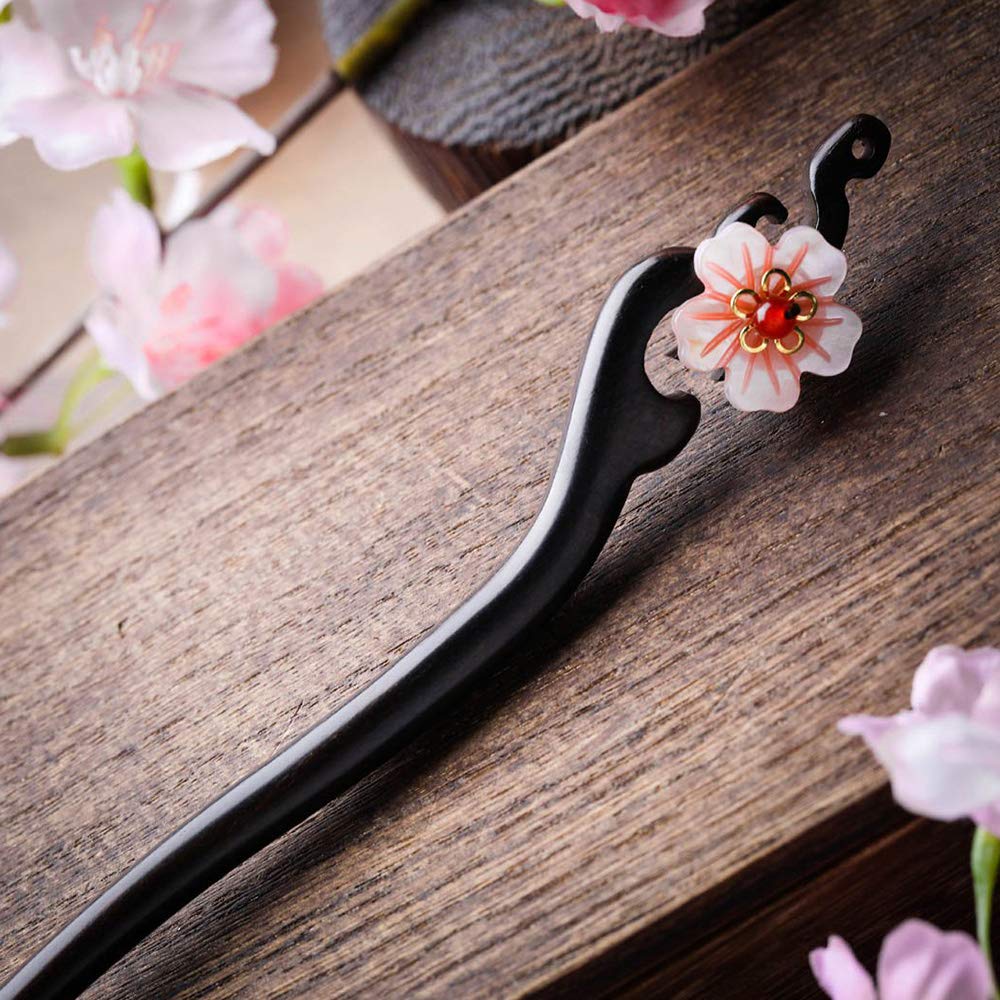 TOP SEWING close-up of ebony wood grain highlighting polished finish and durability