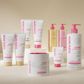 Topicrem family using product in bathroom to show gentle hydration benefit