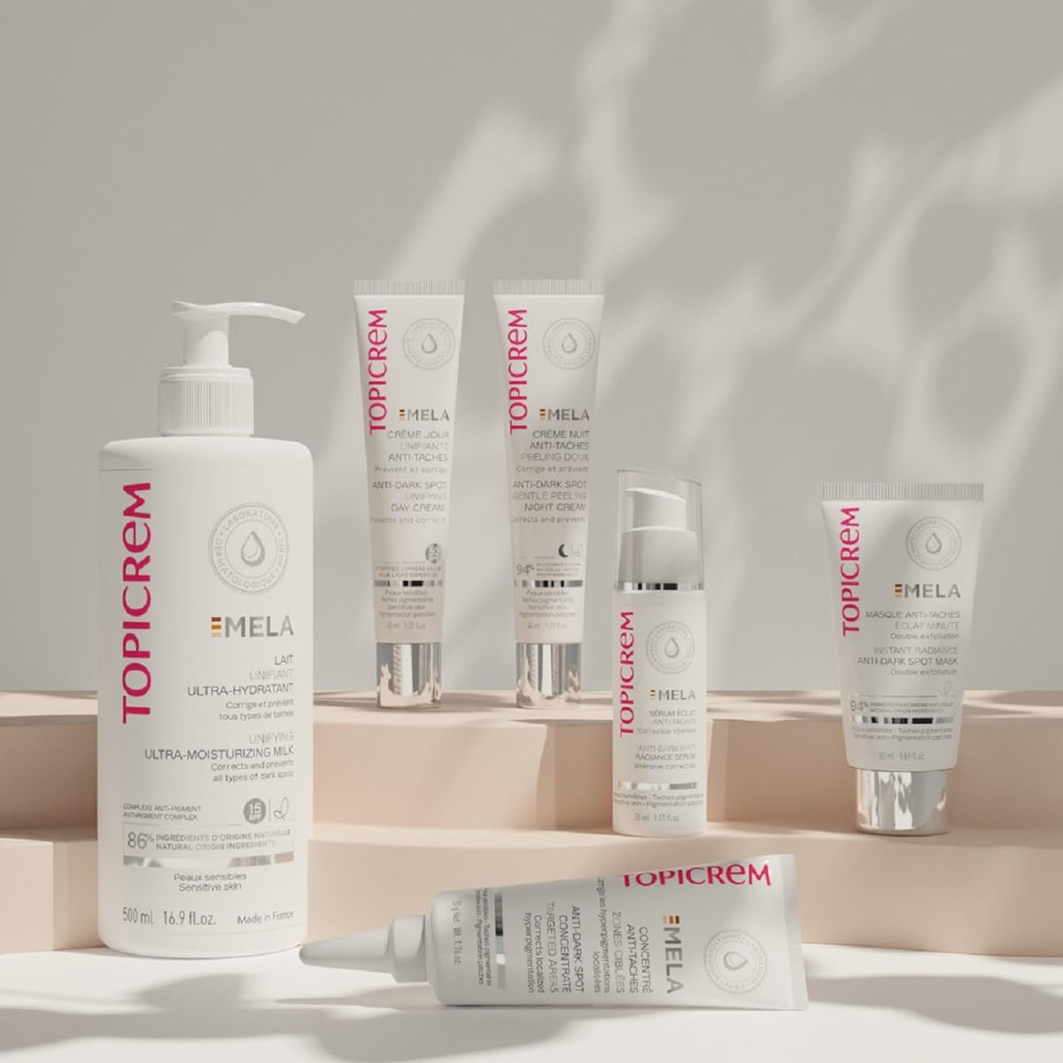 Topicrem milk texture close-up showing fluid non-greasy cream absorbing fast