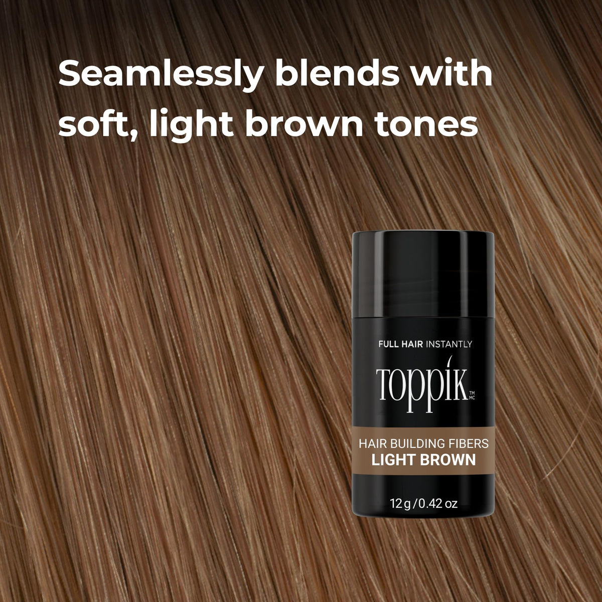 Toppik bottle in hand to show the 27.5g size for convenient everyday carry