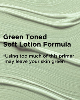 TOUCH IN SOL primer swatched on hand to show green correcting effect