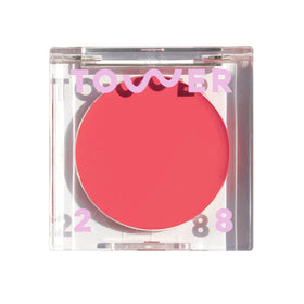 Tower 28 front packaging showing compact tinted lip and cheek balm benefit: easy multitasking