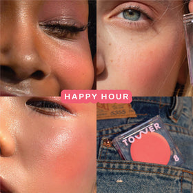 Tower 28 texture close-up revealing creamy coral-pink balm benefit: dewy blendability