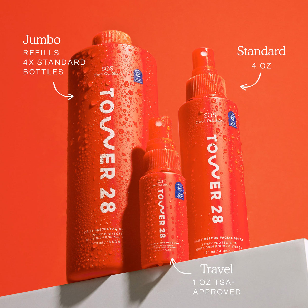 Tower 28 bottle beside a common water bottle highlighting the 16 oz scale