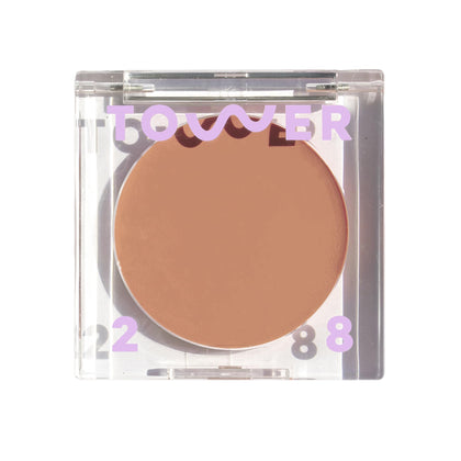 Tower 28 Sculptino compact front view showing neutral matte finish and label benefit