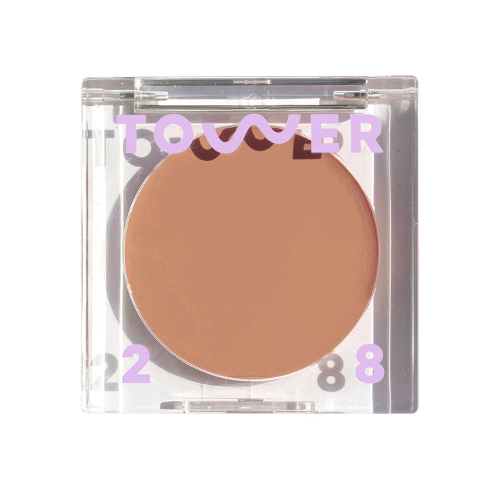 Tower 28 Sculptino compact front view showing neutral matte finish and label benefit