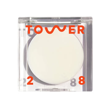 Tower 28 SuperDew front packaging showing compact balm and label, highlights portability
