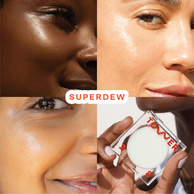 Tower 28 SuperDew open tube with clear balm texture visible, shows smooth melt-in finish