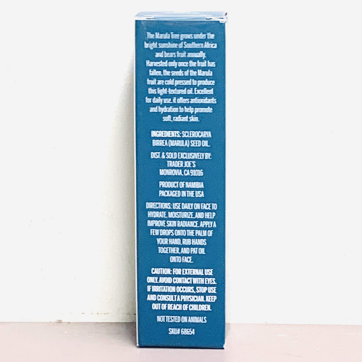 Trader Joe's marula oil textured drop on skin demonstrating lightweight absorbency
