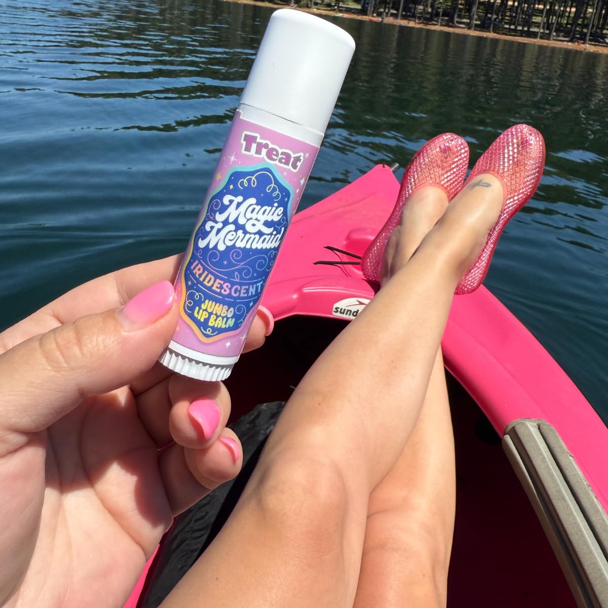 TREAT lip balm tube cap and label detail showcasing brand, flavor, and ingredient callouts