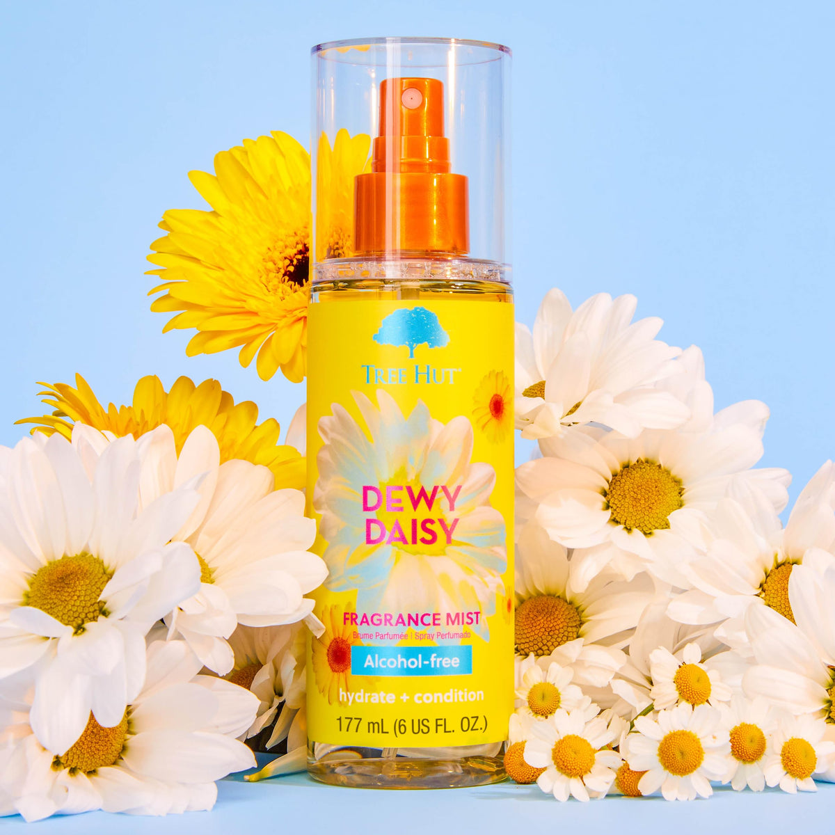 Tree Hut Dewy Daisy hydrating mist being sprayed on skin for instant refresh