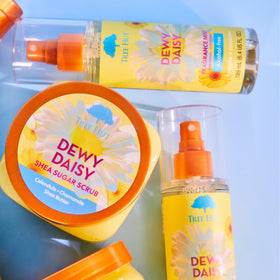 Tree Hut Dewy Daisy set held in hand demonstrating scale and travel-ready size
