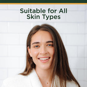 Tree of Life bottle beside moisturizer illustrating easy layering in routines