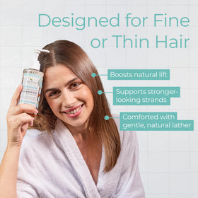 Tree To Tub bottle held in hand showing product size and portability