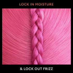 TRESemmé hairspray mist being applied to hair to control frizz and lock styles