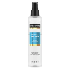TRESemmé in hand scale displaying portable 6.1 oz bottle convenience