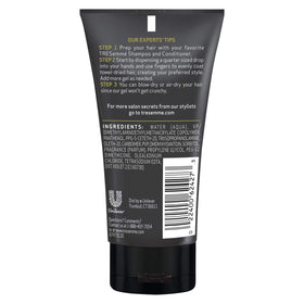 TRESemmé tube held in hand demonstrating compact travel-friendly size