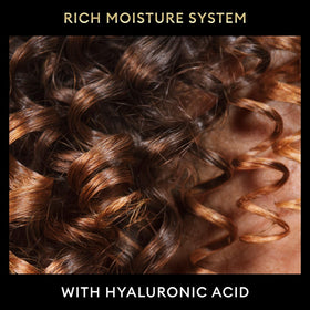 TRESemmé label close-up showing ingredients for strengthened hair