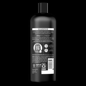 TRESemmé close-up of lather on wet hair demonstrating moisture and softness