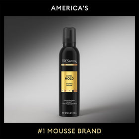 TRESemmé label closeup highlighting hydrolyzed keratin strengthening