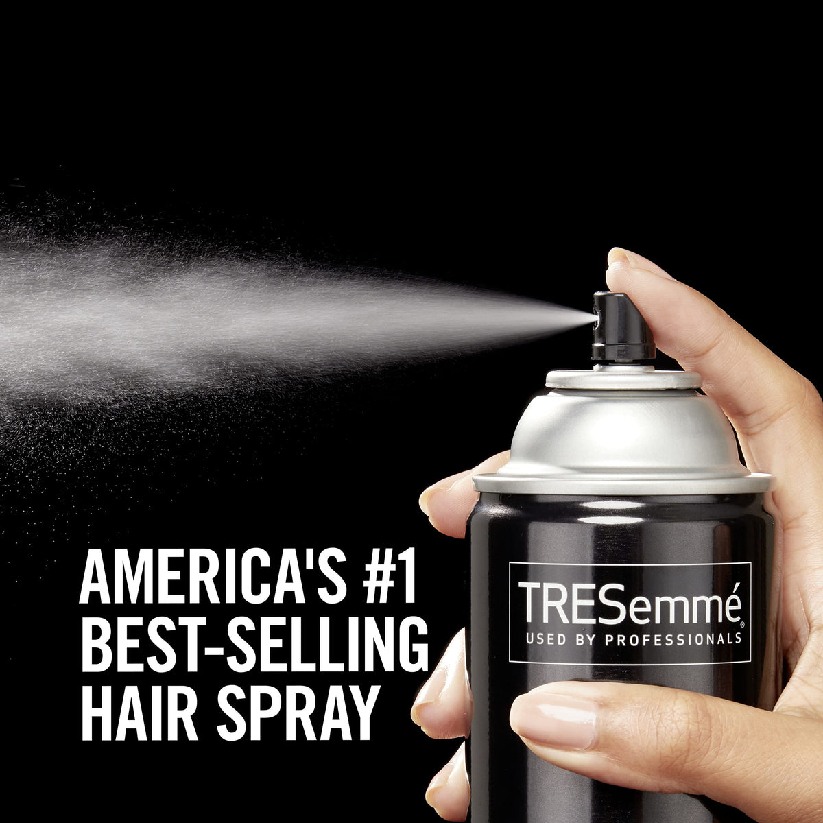 TRESemmé being sprayed on styled hair to set shape and reduce frizz
