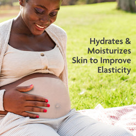 TriLASTIN applied to a pregnant belly providing soothing relief