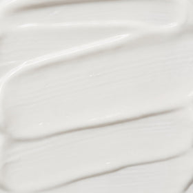 Trilogy sunscreen being applied on hand showing quick absorption benefit