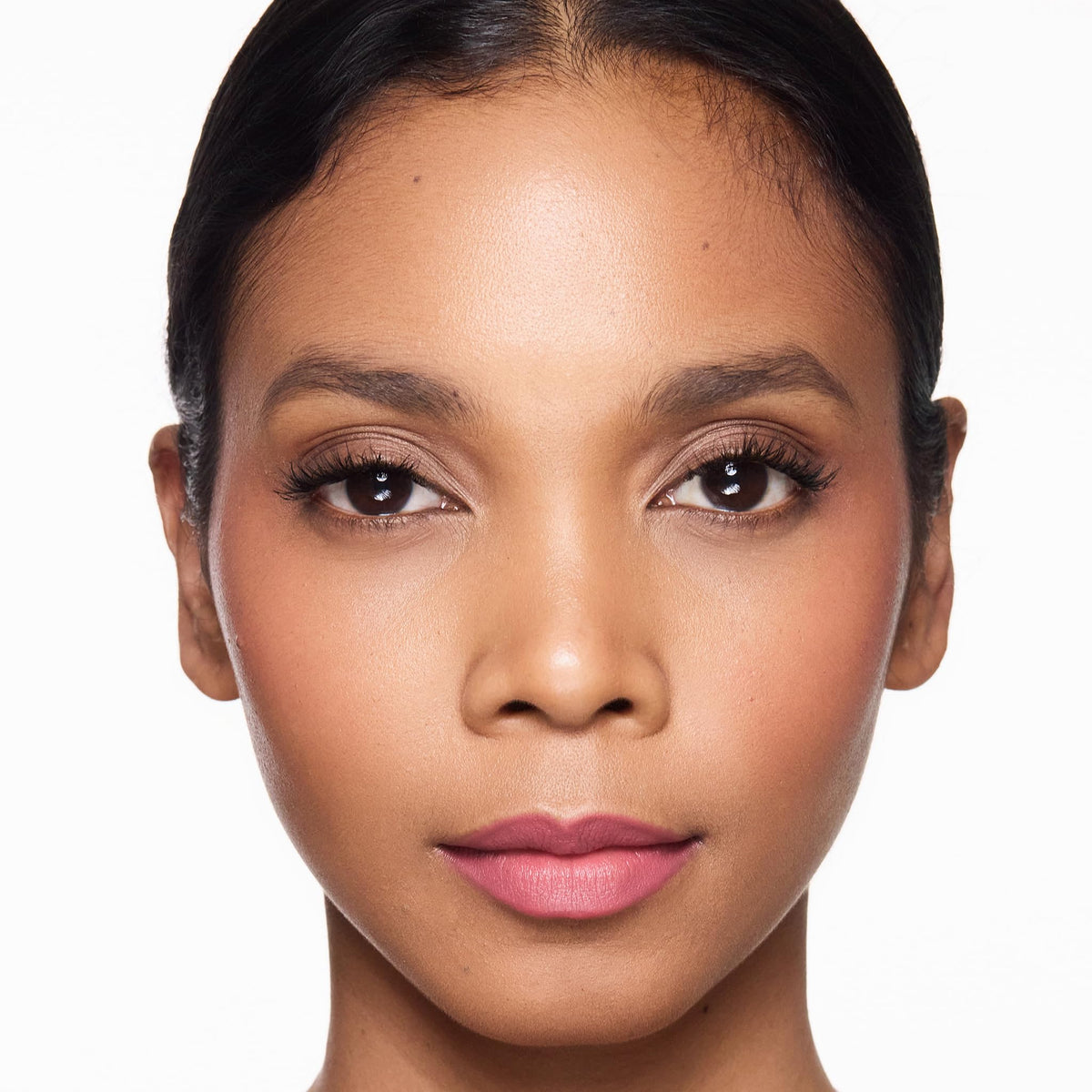 Trish McEvoy lip crayon on model applying shows effortless finish and polished everyday look