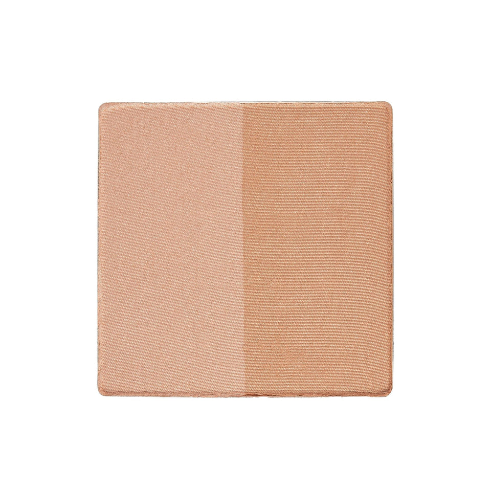 Trish McEvoy front pan showing dual bronzer shades for customizable warmth