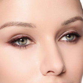 Trish McEvoy eyeliner integrated sponge blending a smoky line for seamless finish