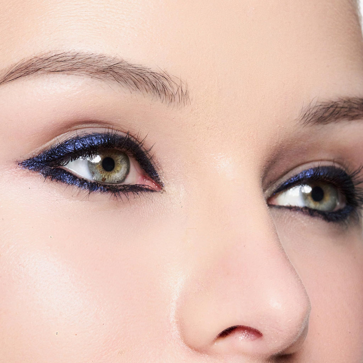 Trish McEvoy eyeliner resisting water droplets illustrating waterproof hold