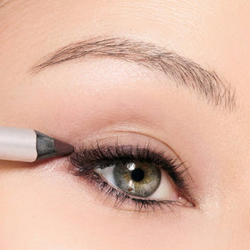 Trish McEvoy applying liner between lashes for natural lash-defining benefit
