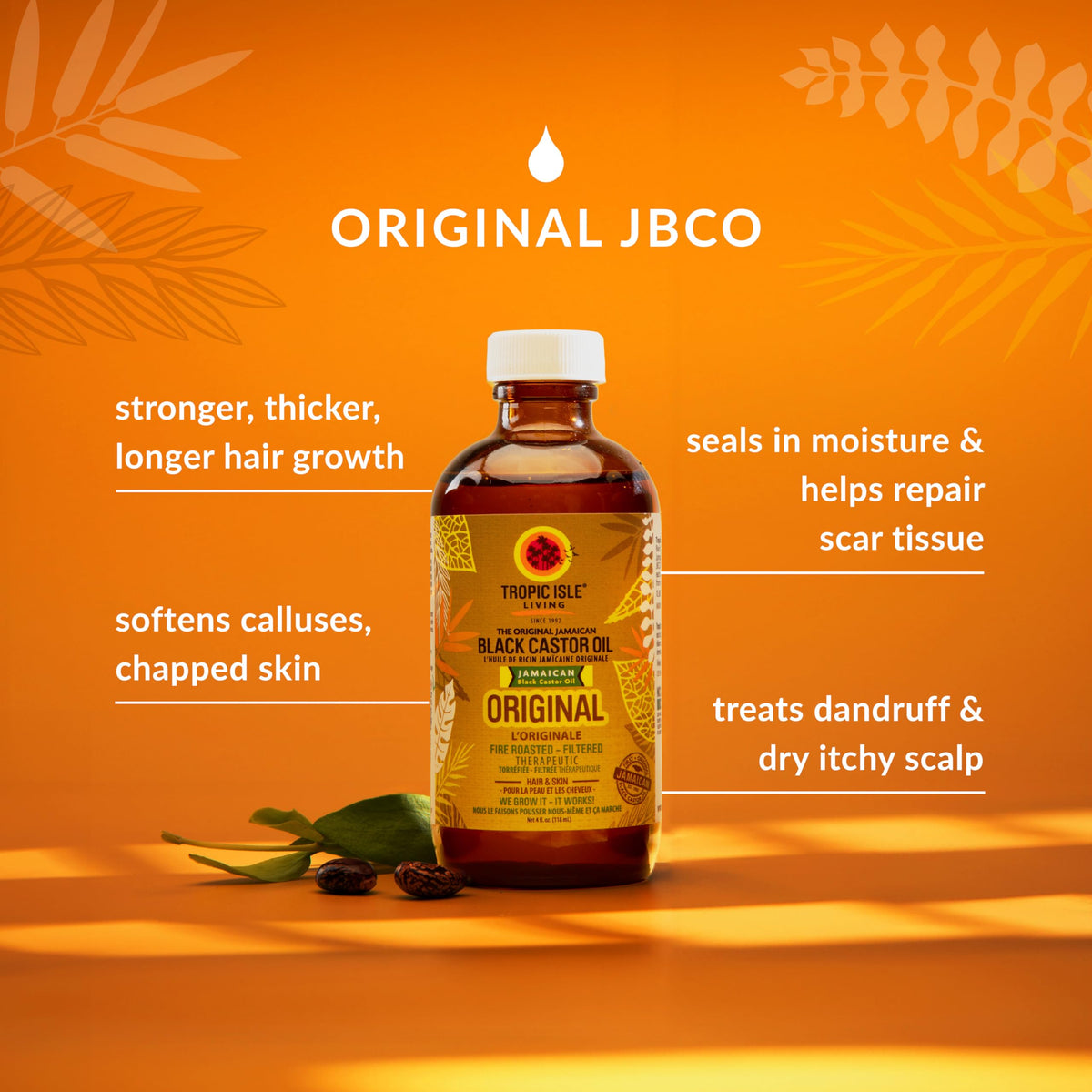 Tropic Isle Living oil drop from open cap showing rich texture and nourishment