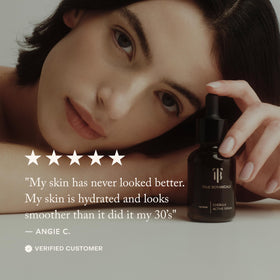 True Botanicals serum on hand being smoothed in demonstrating immediate absorption