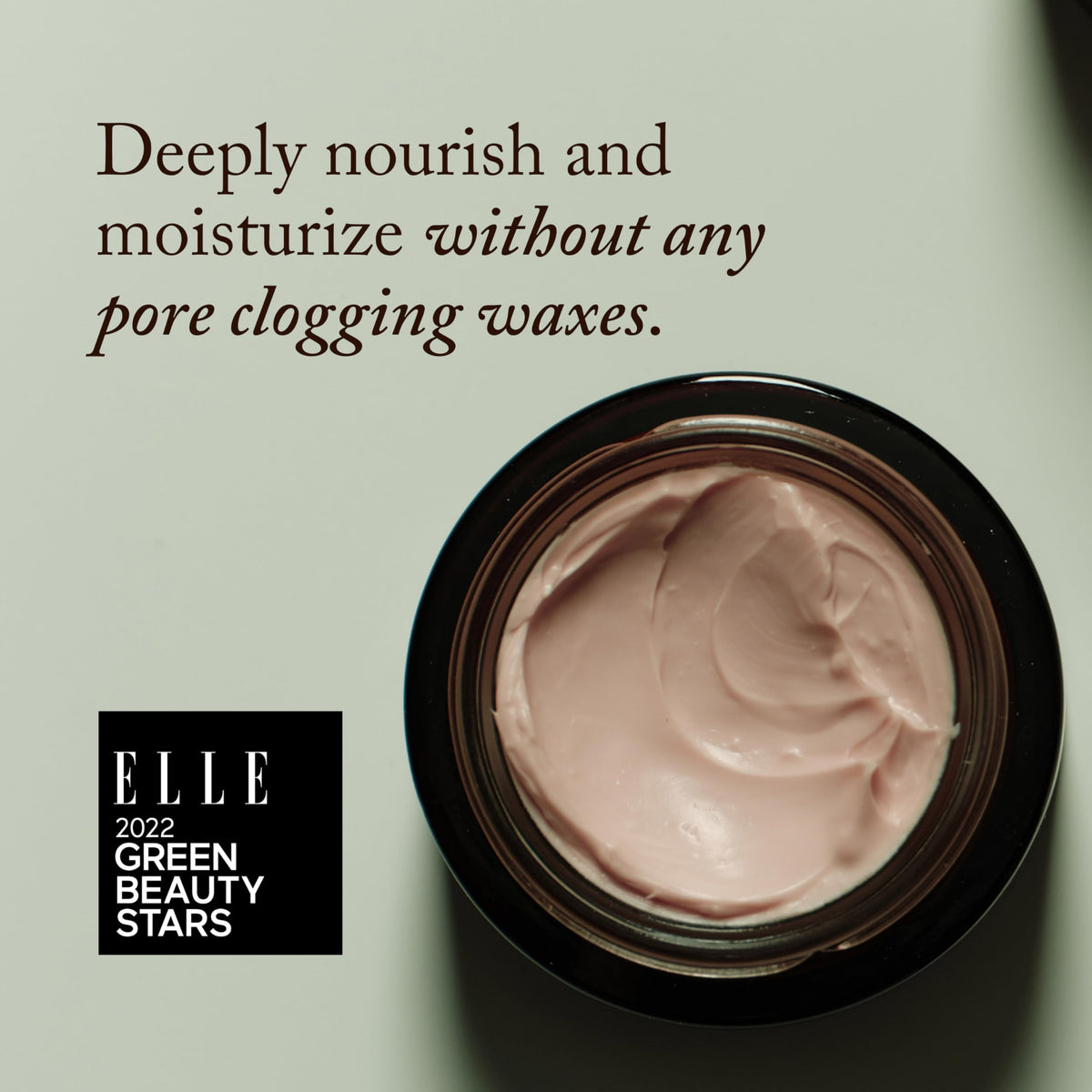 True Botanicals open jar revealing pink cream texture for rich hydration