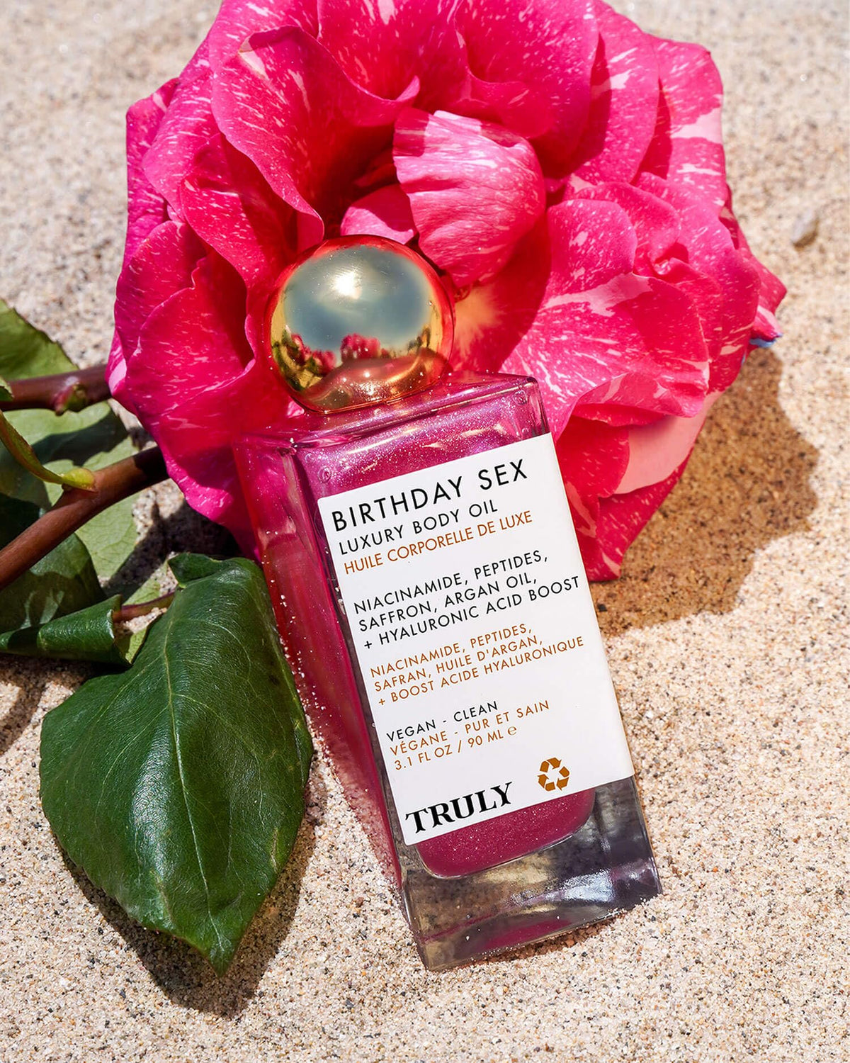 Truly oil styled with evening outfit suggesting scent pairs with occasions benefit
