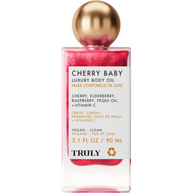 Truly Cherry Baby bottle surrounded by flowers suggesting natural botanicals benefit