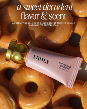 Truly gloss in a handbag with mirror illustrating on-the-go touch-ups