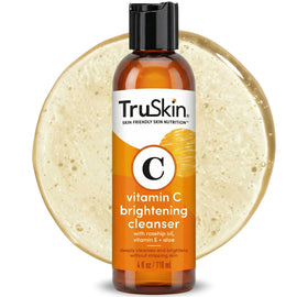 TruSkin front packaging photographed on neutral surface showing product benefit