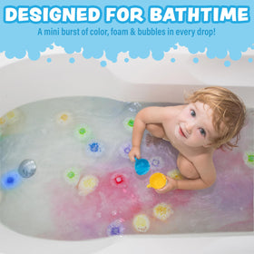 Tub Works Lil' Bursts floating in bathtub creating colorful foam for engaging toddler play