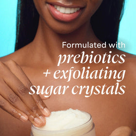 TULA scrub being scooped from jar in hand demonstrating application ease and control