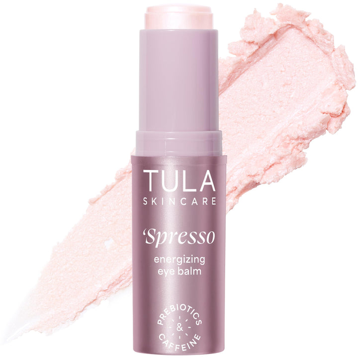 TULA Spresso eye balm front packaging showing compact stick and rose glow benefit