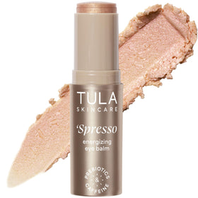 TULA Spresso eye balm front packaging showing compact portable design and benefits