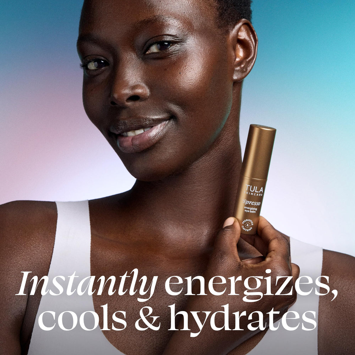 TULA Spresso eye balm stick open revealing balm tip and travel-friendly convenience