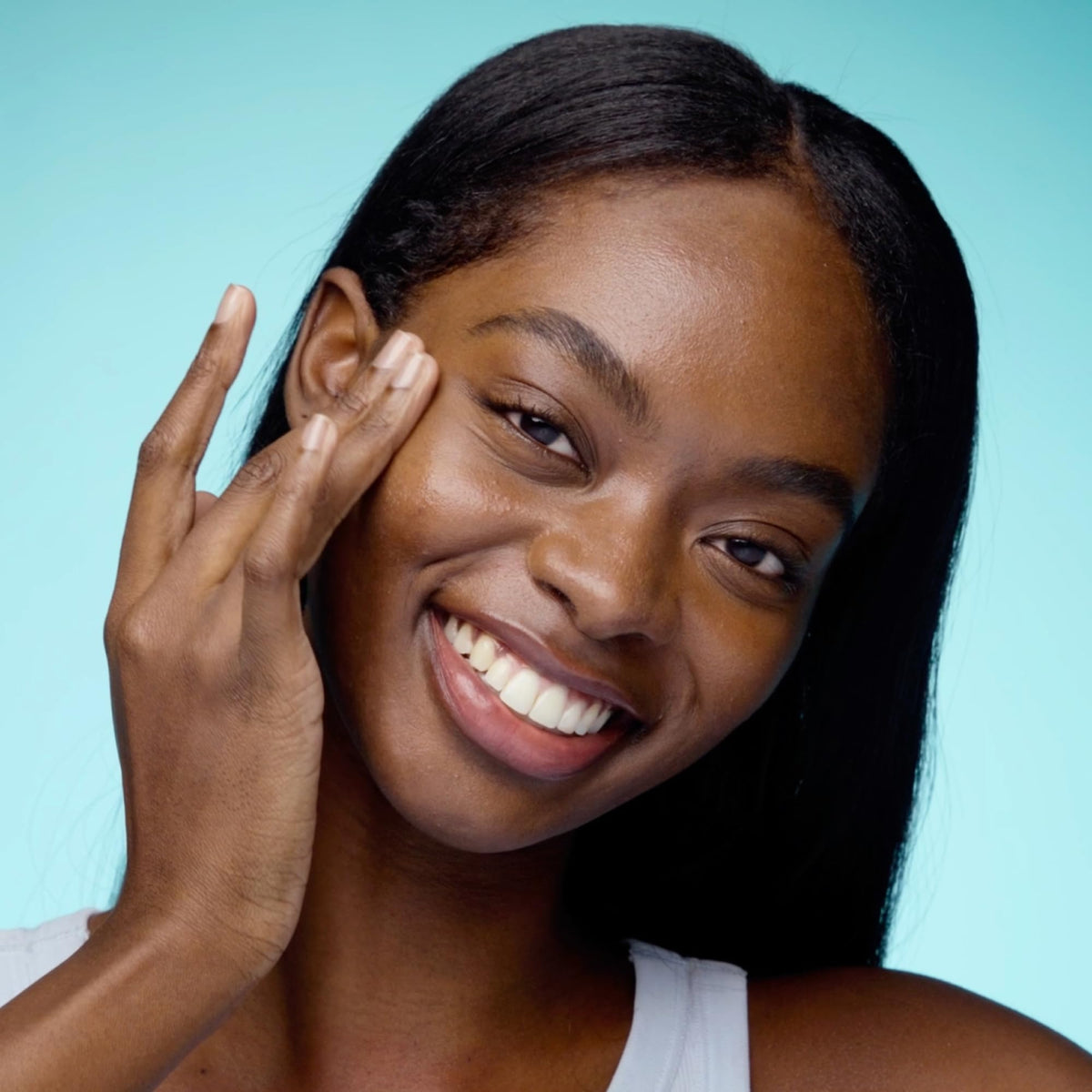 TULA dropper dispensing serum onto fingertip, demonstrates precise application benefit