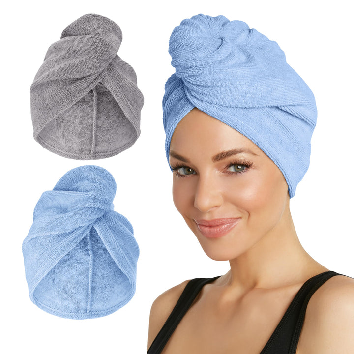 Turbie Twist two-pack front view showing grey and blue towels and packaging benefits quick drying